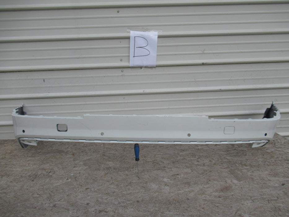 2017-2019 AUDI Q7 REAR LOWER BUMPER COVER W/ PARKING SENSOR HOLES OEM