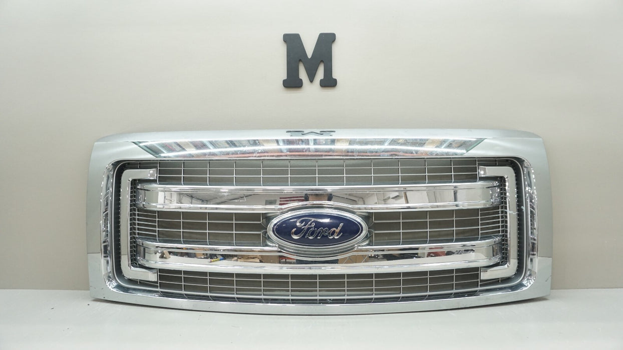 2013-2014 FORD F-150 RADIATOR GRILL GRILLE MOLDING CHROME W/ EMBLEM DL348200 OEM