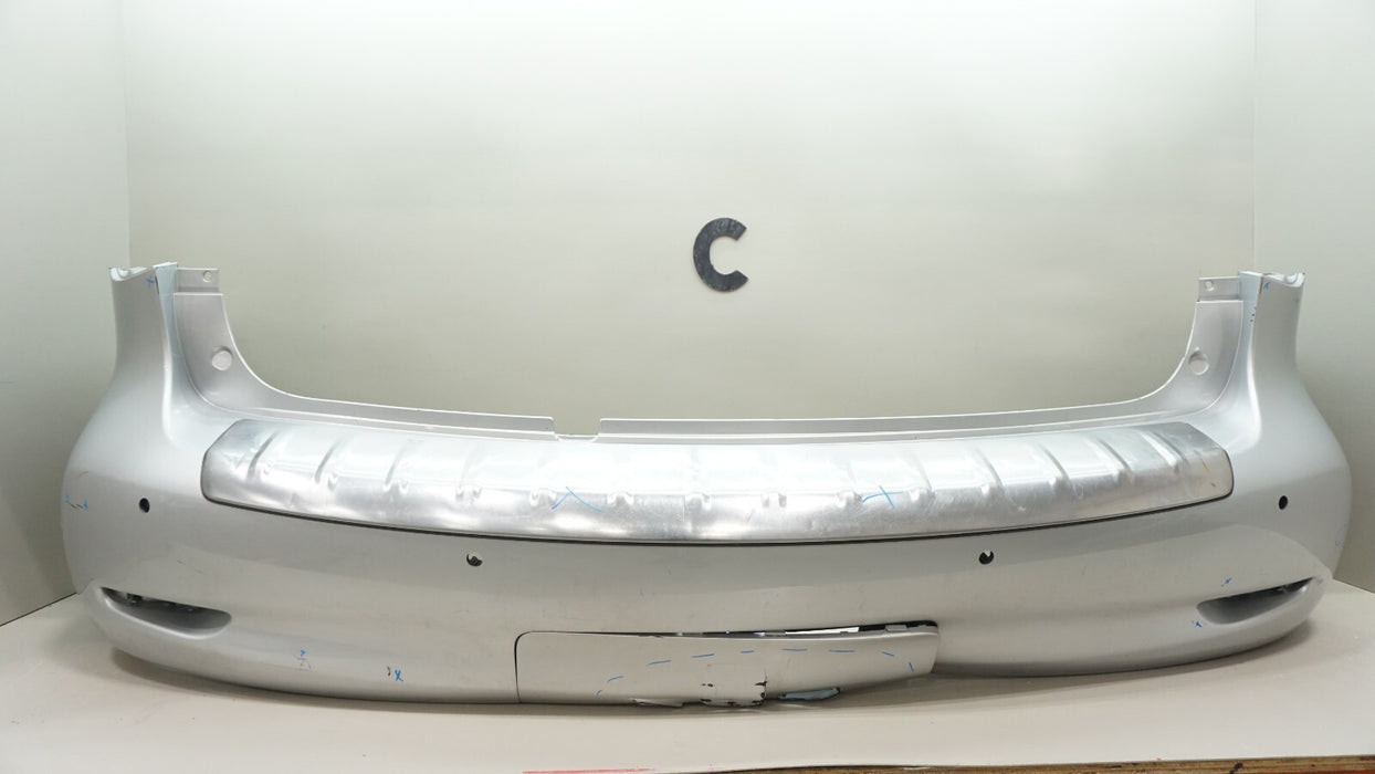 2011-2013 INFINITI QX56 REAR BUMPER COVER W/ SENSOR HOLES 85022 1LA0H OEM