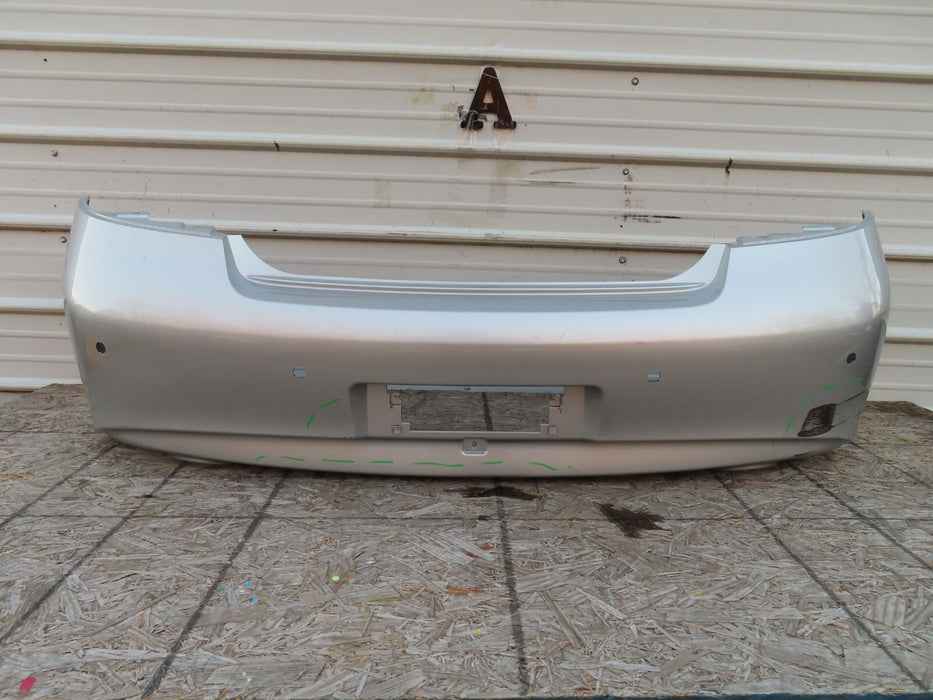 2010-2013 INFINITI G25 G35 Q40 REAR BUMPER COVER OEM