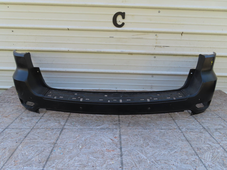 2011-2021 JEEP GRAND CHEROKEE LAREDO LIMITED OVERLAND REAR BUMPER COVER OEM