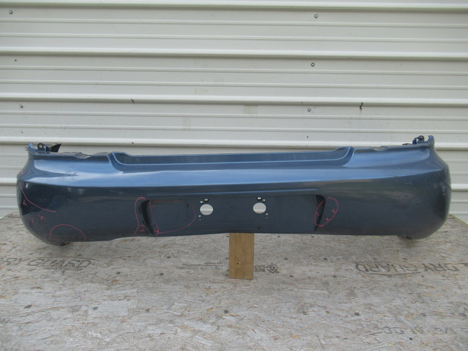 2005 - 2007 SUBARU WRX STI REAR BUMPER COVER PANEL FACTORY 57704FE160 OEM