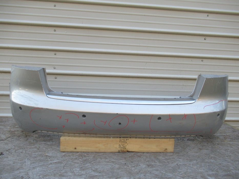 2005 - 2008 AUDI A4 REAR BUMPER COVER PANEL W/ PARKING SENSOR HOLES OEM