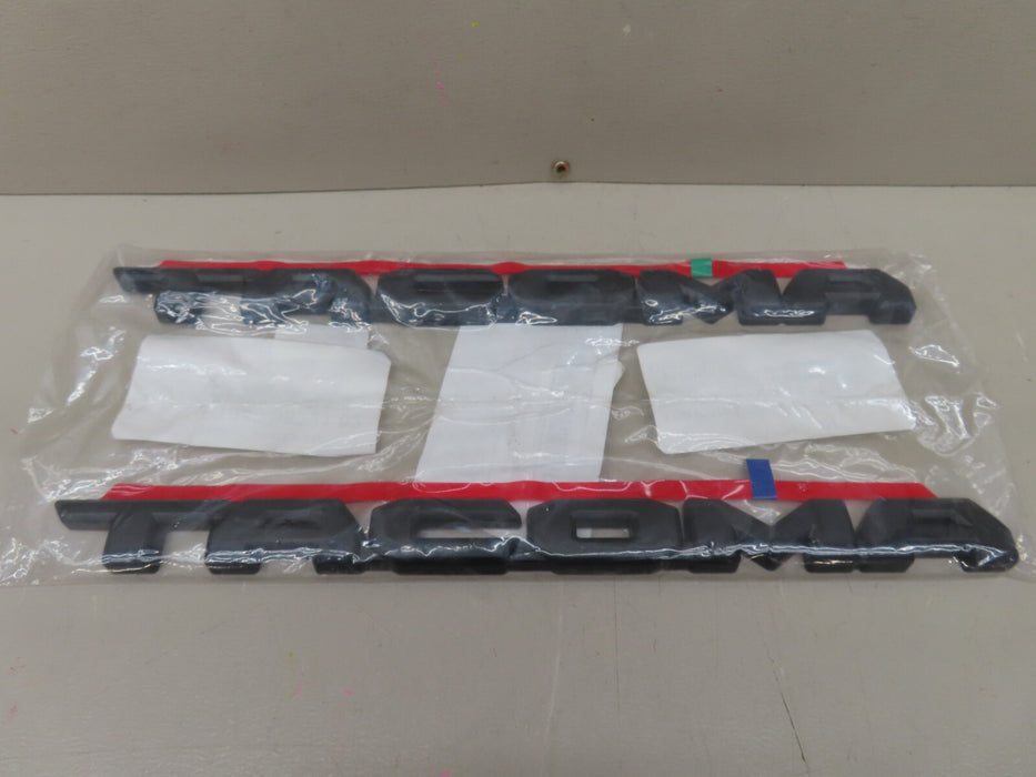 2016-2023 TOYOTA TACOMA GENUINE BLACKOUT EMBLEM NAMEPLATE OEM PT948-35221-02