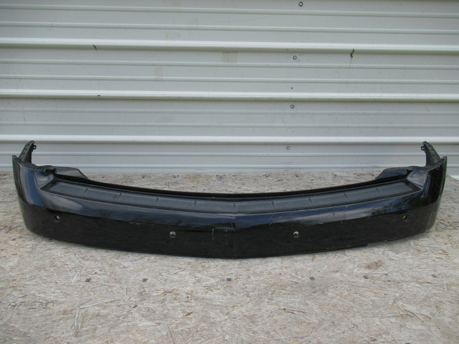 2010-2016 CADILLAC SRX REAR BUMPER COVER PANEL BLACK PLASTIC 20835695 OEM
