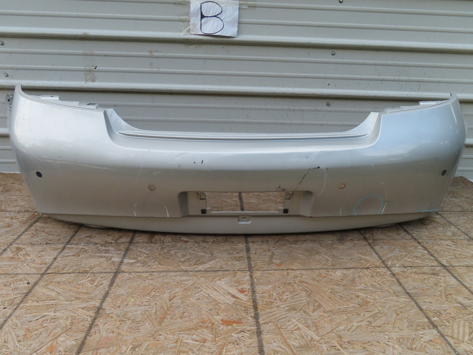 2010-2013 INFINITI G25 G35 Q40 REAR BUMPER COVER OEM