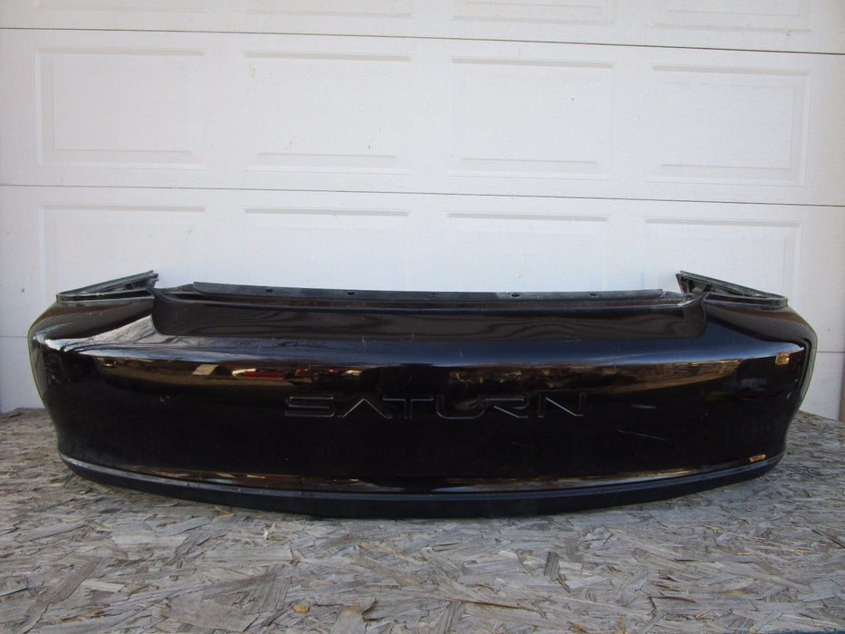 00 01 02 SATURN L SERIES SEDAN REAR BUMPER COVER OEM