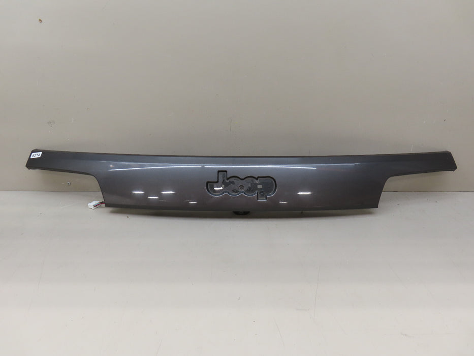 2014-2024 JEEP GRAND CHEROKEE REAR TRIM PANEL MOLDING W/CAMERA OEM 1WD55TRMAD
