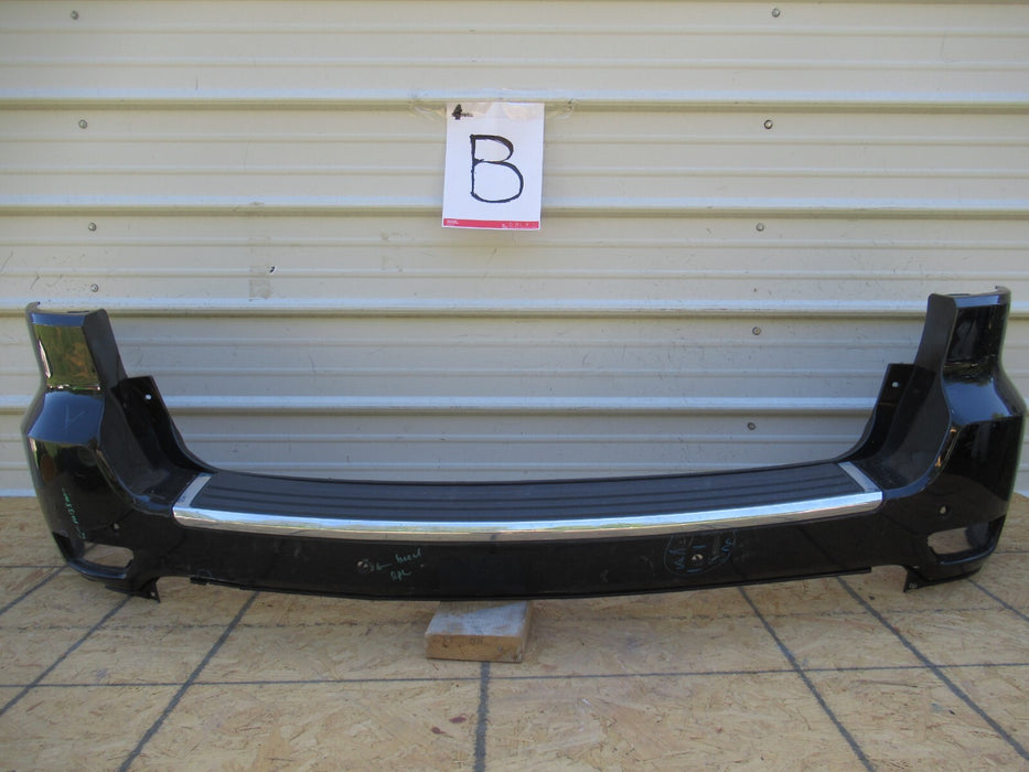 2011-2020 JEEP GRAND CHEROKEE REAR BUMPER COVER PANEL PLASTIC 57010724AD OEM