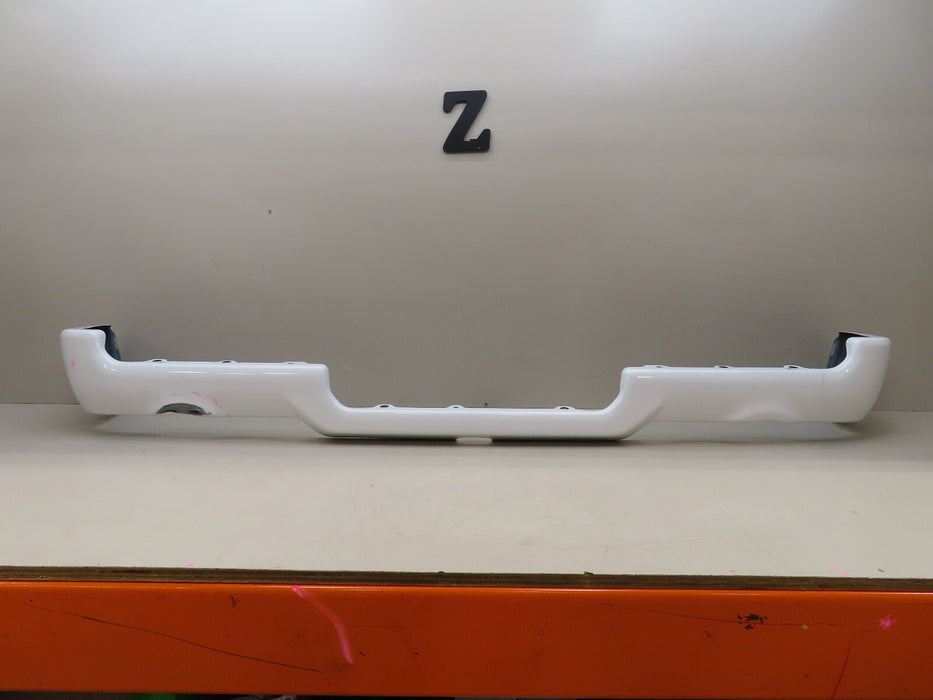 2019-2024 DODGE RAM 1500 REAR BUMPER COVER OEM 68404438AB