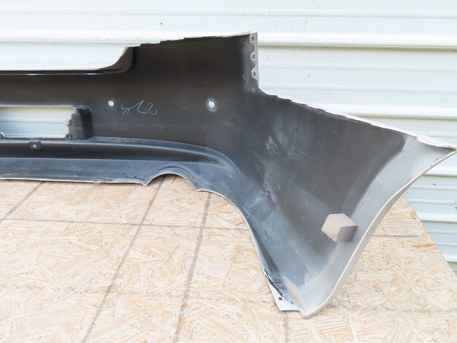 2010-2013 INFINITI G25 G35 Q40 REAR BUMPER COVER OEM