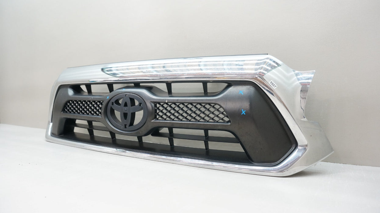 2012-2015 TOYOTA TACOMA FRONT BUMPER RADIATOR GRILLE OEM 53100-04470