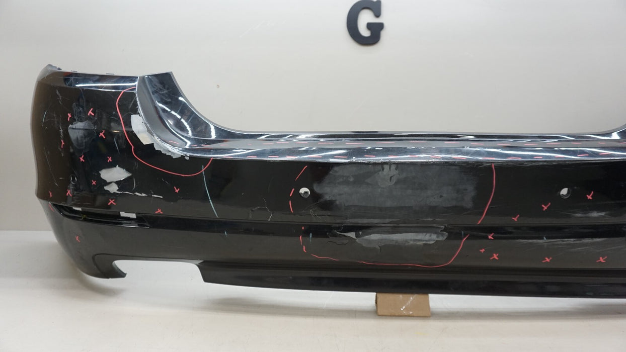 2011-2013 BMW 528I F10 SEDAN REAR BUMPER COVER PANEL W/ SENSOR HOLE OEM 7240372