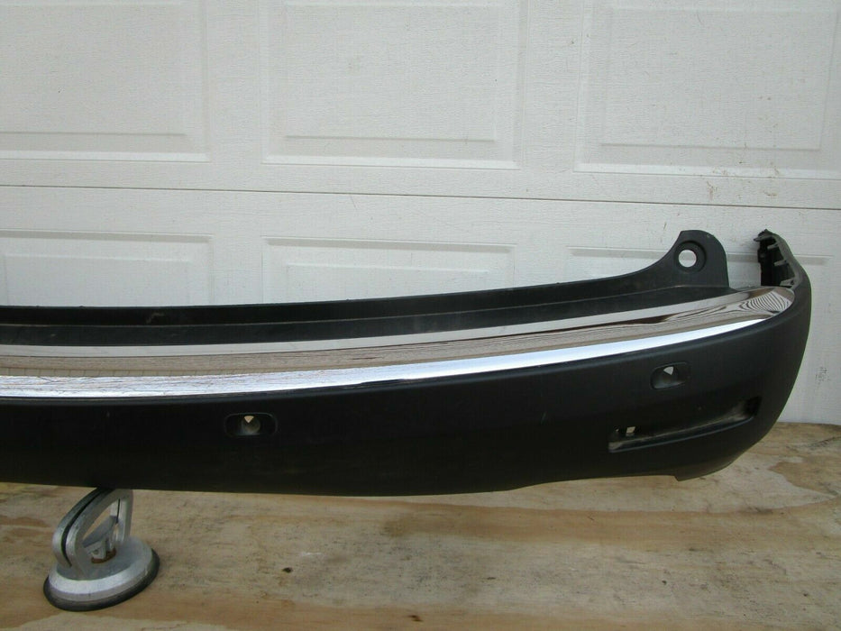 2007-2012 GMC ACADIA REAR BUMPER COVER PANEL PLASTIC W/ SENSOR HOLES OEM