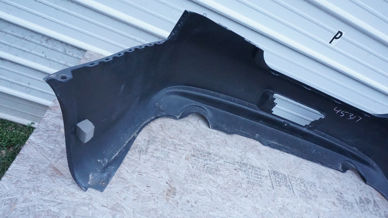 2010-2013 INFINITI G37 REAR BUMPER COVER PANEL PLASTIC 850221NF0H OEM 12 13