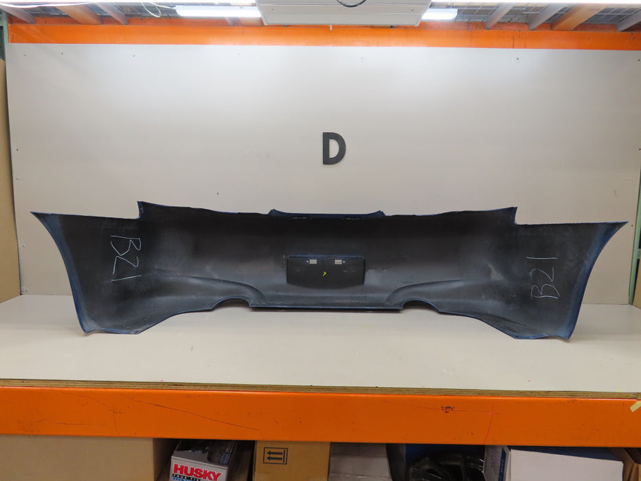 2009-2013 INFINITI G37 REAR BUMPER COVER OEM 85022-JJ50H