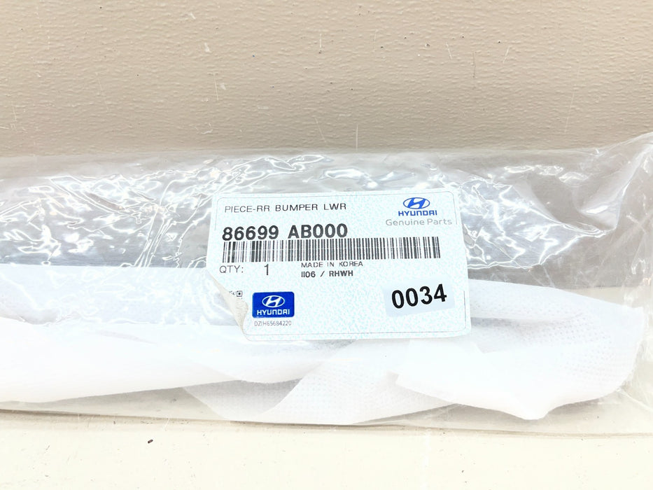 2021-2023 HYUNDAI ELANTRA REAR LOWER BUMPER CHROME TRIM CENTER 86699-AB000 OEM