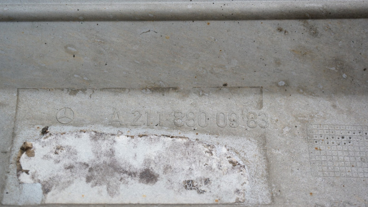 2003-2006 MERCEDES E55 AMG SPORT REAR BUMPER OEM (HARD PLASTIC) A2118800983