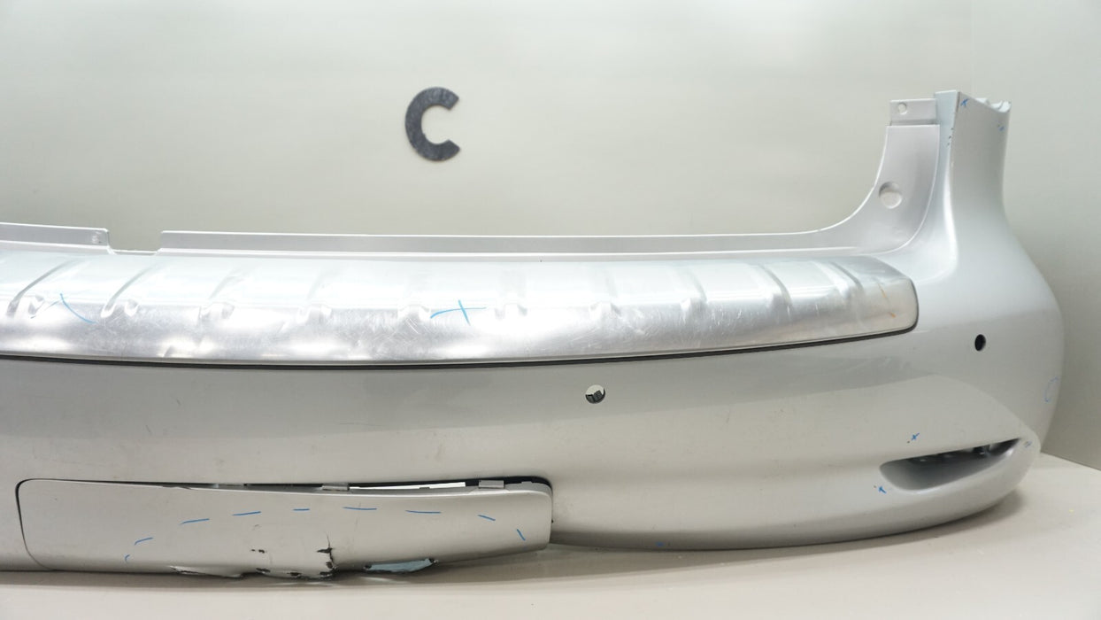 2011-2013 INFINITI QX56 REAR BUMPER COVER W/ SENSOR HOLES 85022 1LA0H OEM
