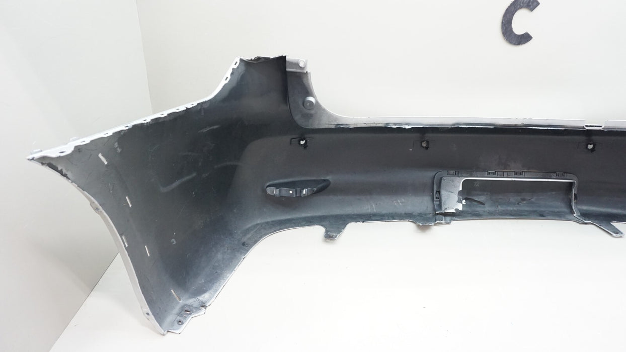 2011-2013 INFINITI QX56 REAR BUMPER COVER W/ SENSOR HOLES 85022 1LA0H OEM