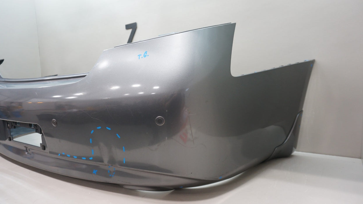 2009-2013 INFINITI G37 SEDAN REAR BUMPER COVER PANEL OEM