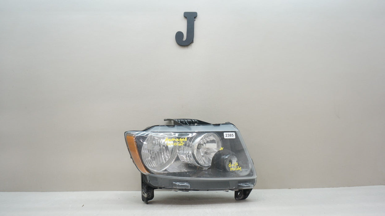 2011-2013 JEEP GRAND CHEROKEE FRONT RIGHT HALOGEN BLACK HEADLIGHT OEM