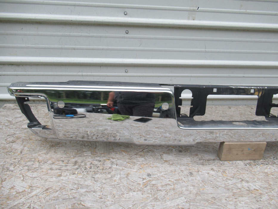 2014-2018 GMC SIERRA 1500 REAR BUMPER COVER CHROME W/ SENSOR HOLES OEM