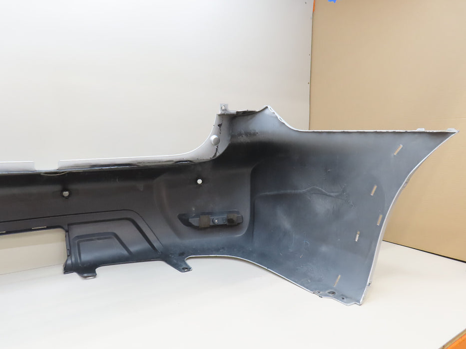 2017-2018 NISSAN ARMADA REAR BUMPER COVERW/SENSOR HOLES  OEM 85022 5ZW0H