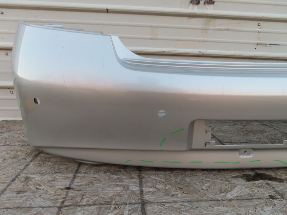 2010-2013 INFINITI G25 G35 Q40 REAR BUMPER COVER OEM