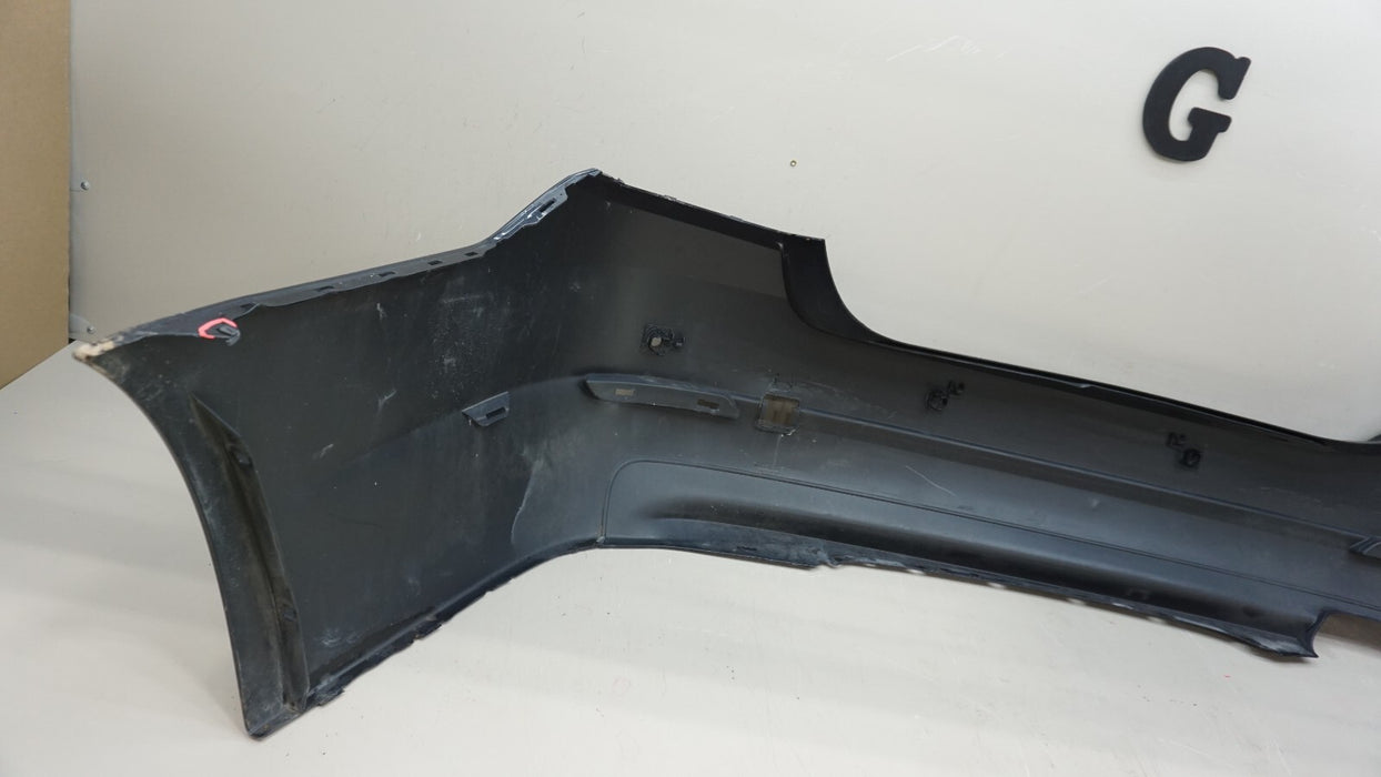 2011-2013 BMW 528I F10 SEDAN REAR BUMPER COVER PANEL W/ SENSOR HOLE OEM 7240372