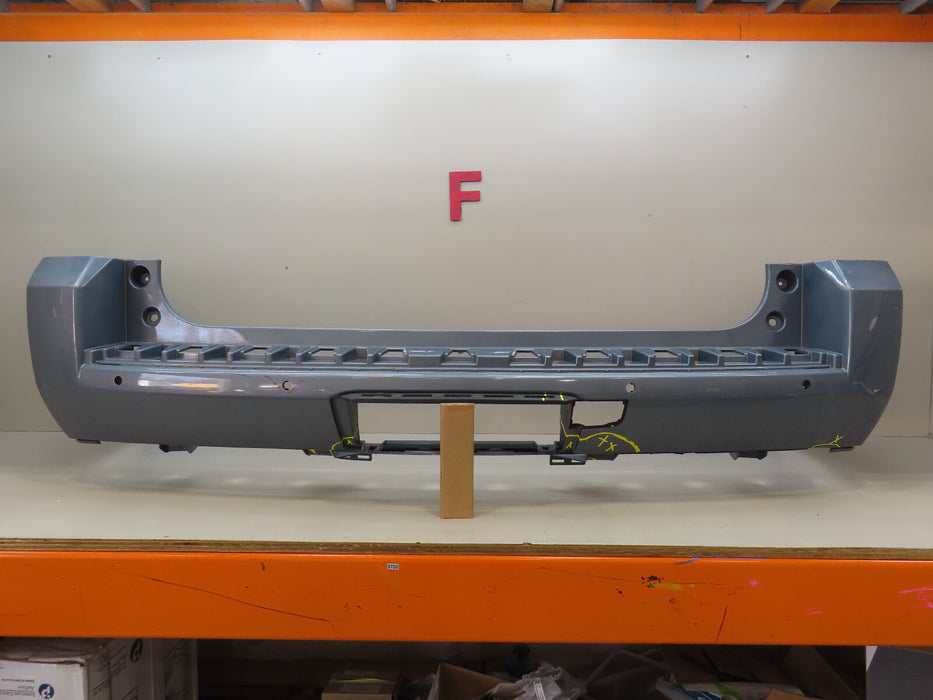 2015-2020 GMC YUKON REAR BUMPER COVER OEM