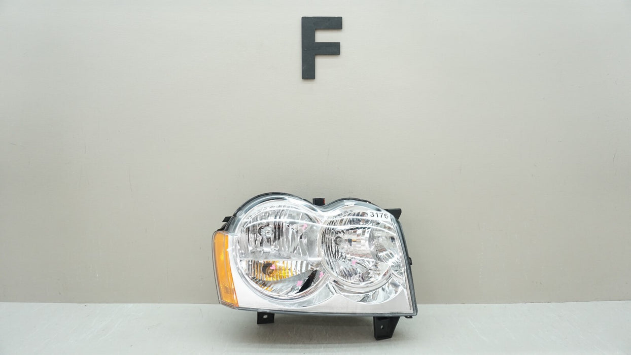 2005-2007 JEEP GRAND CHEROKEE FRONT PASSENGER HEADLIGHT HALOGEN AFTERMARKET