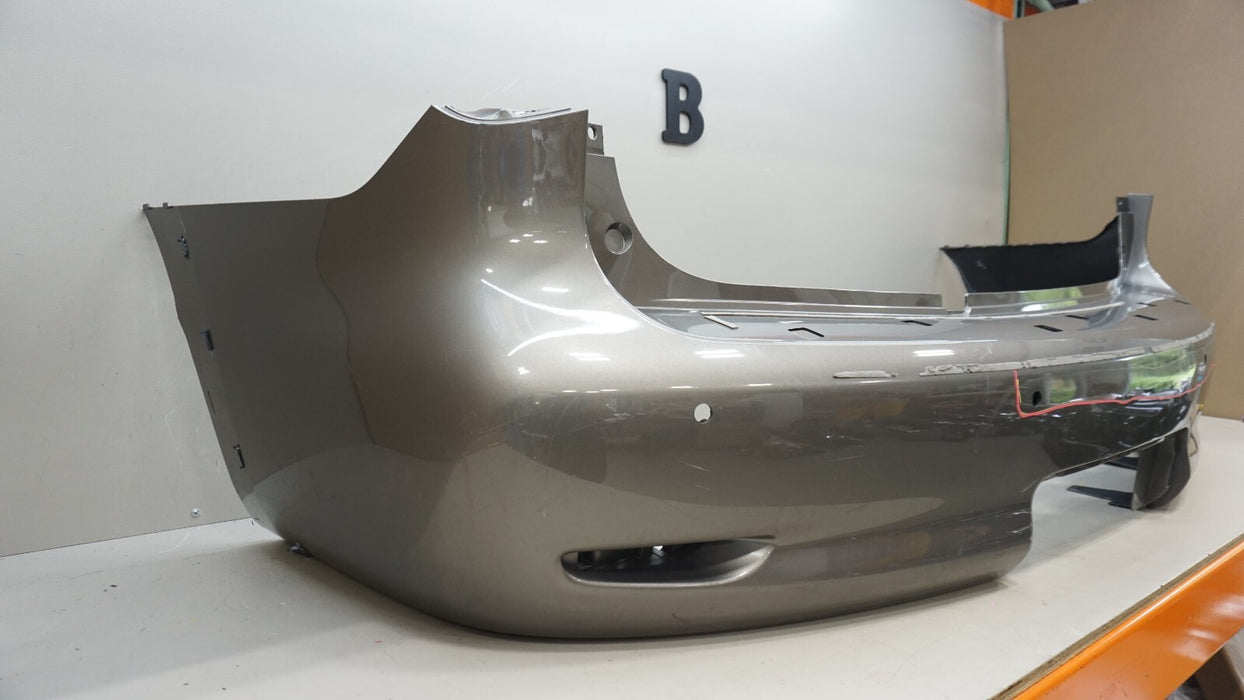 2011-2013 INFINITI QX56 REAR BUMPER COVER PANEL W/ SENSOR HOLE OEM 85022-1LA0H