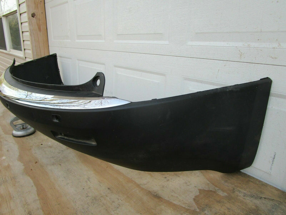 2007-2012 GMC ACADIA REAR BUMPER COVER PANEL PLASTIC W/ SENSOR HOLES OEM