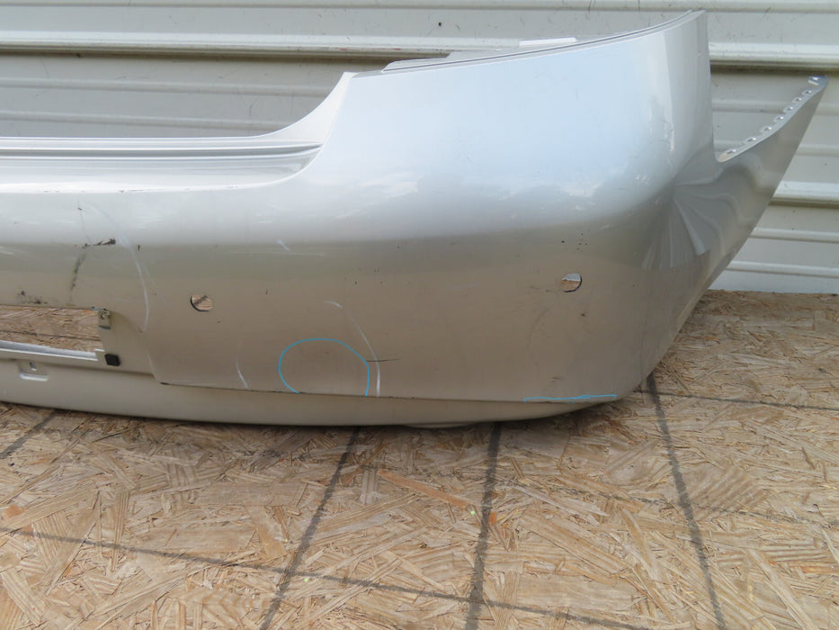 2010-2013 INFINITI G25 G35 Q40 REAR BUMPER COVER OEM