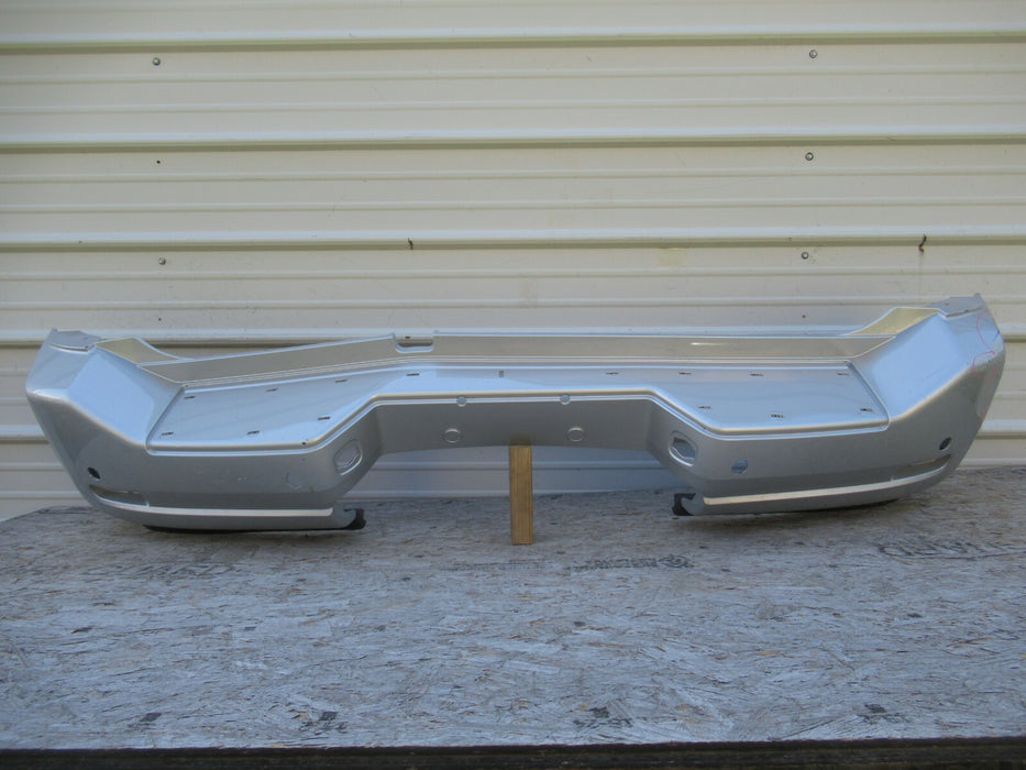 2008-2015 NISSAN ARMADA REAR BUMPER COVER PANEL PANEL 85022-ZQ00A OEM