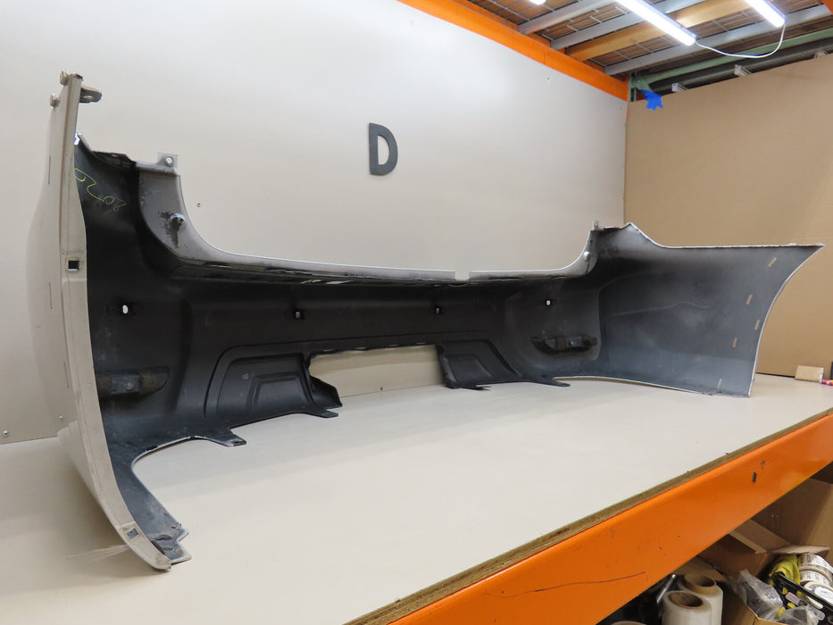 2017-2018 NISSAN ARMADA REAR BUMPER COVERW/SENSOR HOLES  OEM 85022 5ZW0H