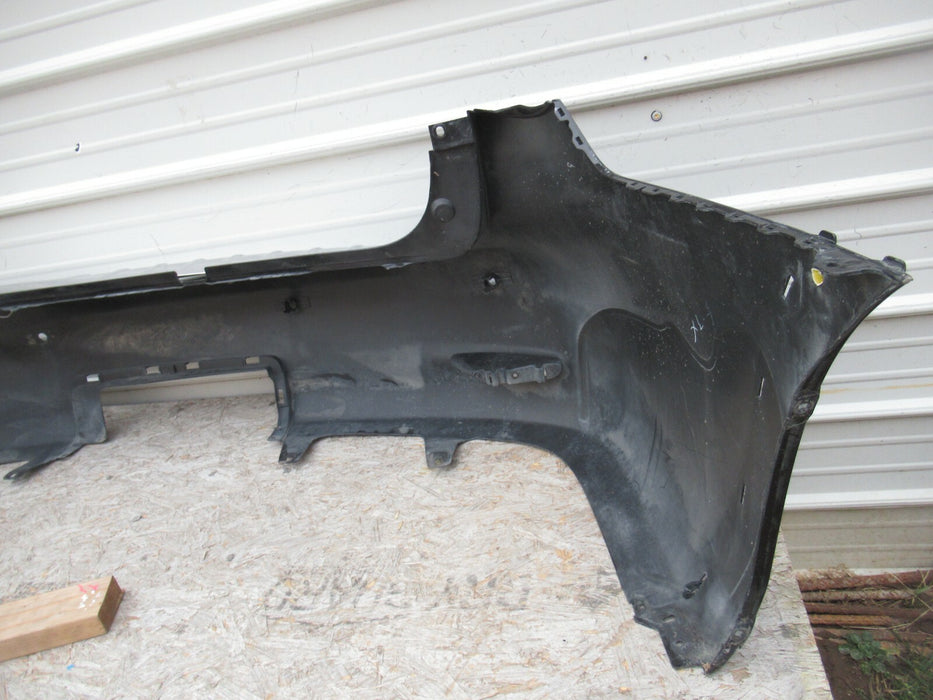 2011-2013 INFINITY QX56 REAR BUMPER COVER PANEL W/ PARKING SENSOR HOLES OEM