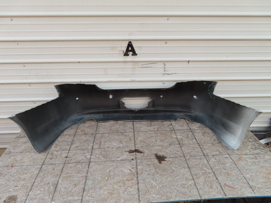 2010-2013 INFINITI G25 G35 Q40 REAR BUMPER COVER OEM