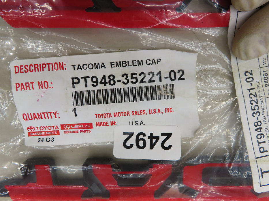 2016-2023 TOYOTA TACOMA GENUINE BLACKOUT EMBLEM NAMEPLATE OEM PT948-35221-02