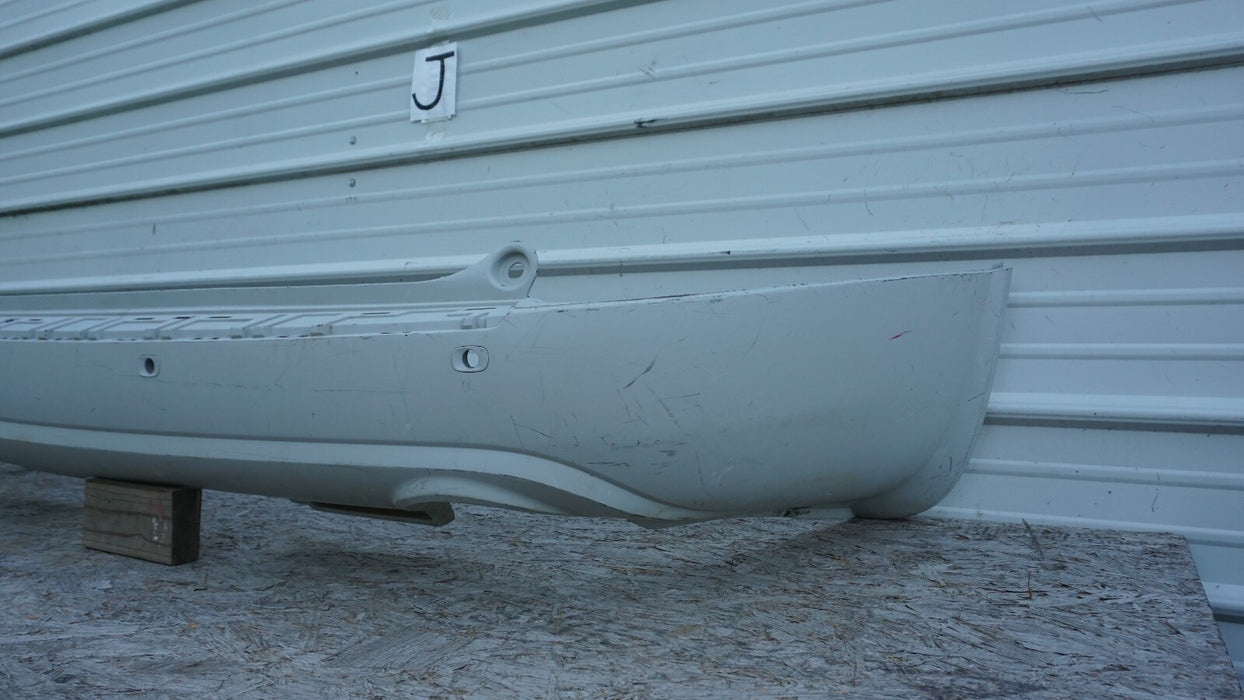 2008-2012 BUICK ENCLAVE REAR BUMPER COVER PANEL PLASTIC FACTORY OEM