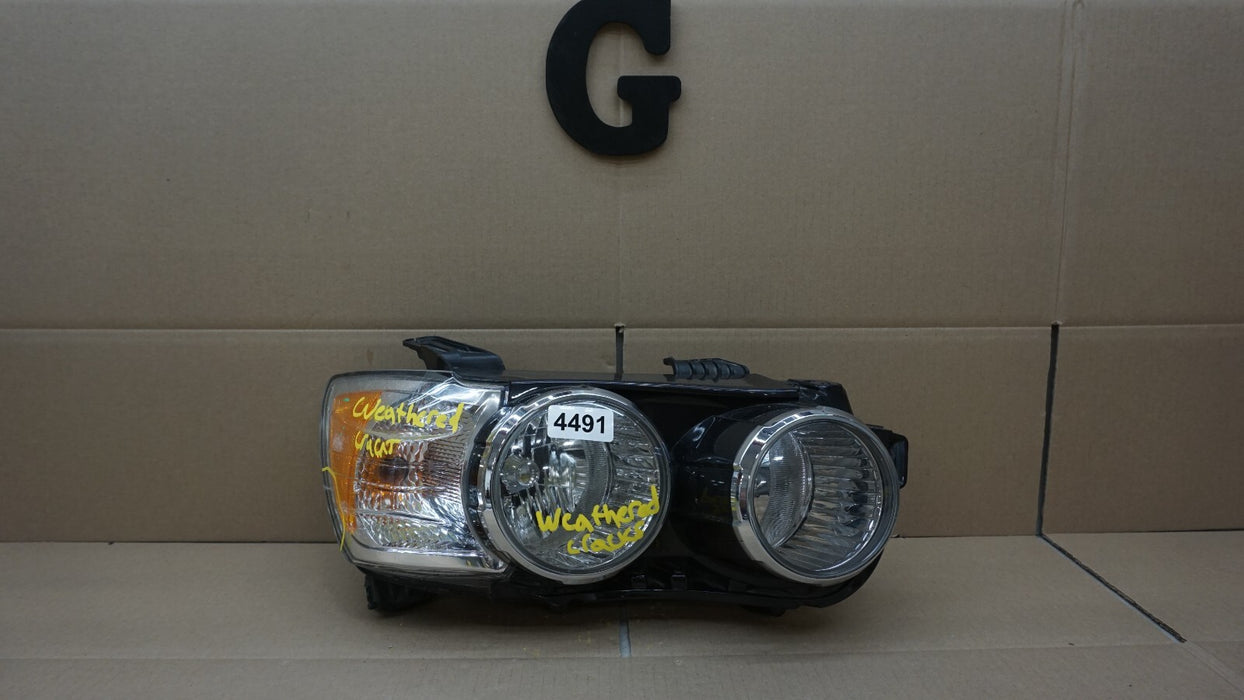 2012-2015 CHEVROLET SONIC FRONT RIGHT PASSENGER SIDE HEADLIGHT HALOGEN OEM.