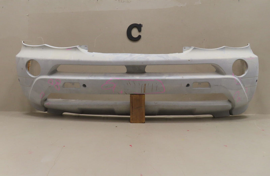 2004-2006 BMW X5 E53 FRONT BUMPER COVER PANEL W/ SENSOR HOLE OEM 51190302568