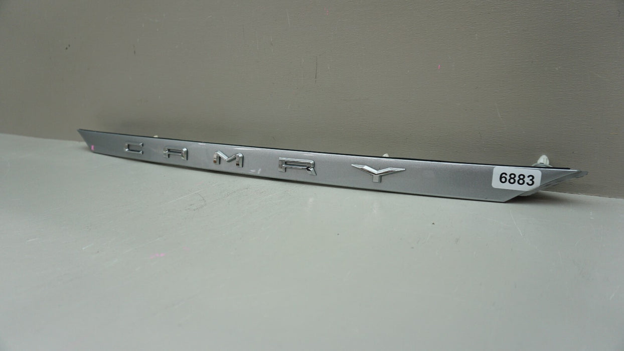2018-2023 TOYOTA CAMRY REAR TAILGATE BADGE TRIM 76811-06B70 OEM