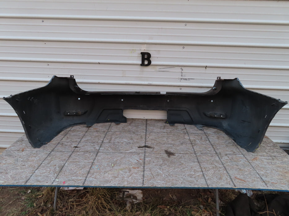 2017-2018 NISSAN ARMADA REAR BUMPER COVER OEM 85022 5ZW0H W/SENSOR HOLES