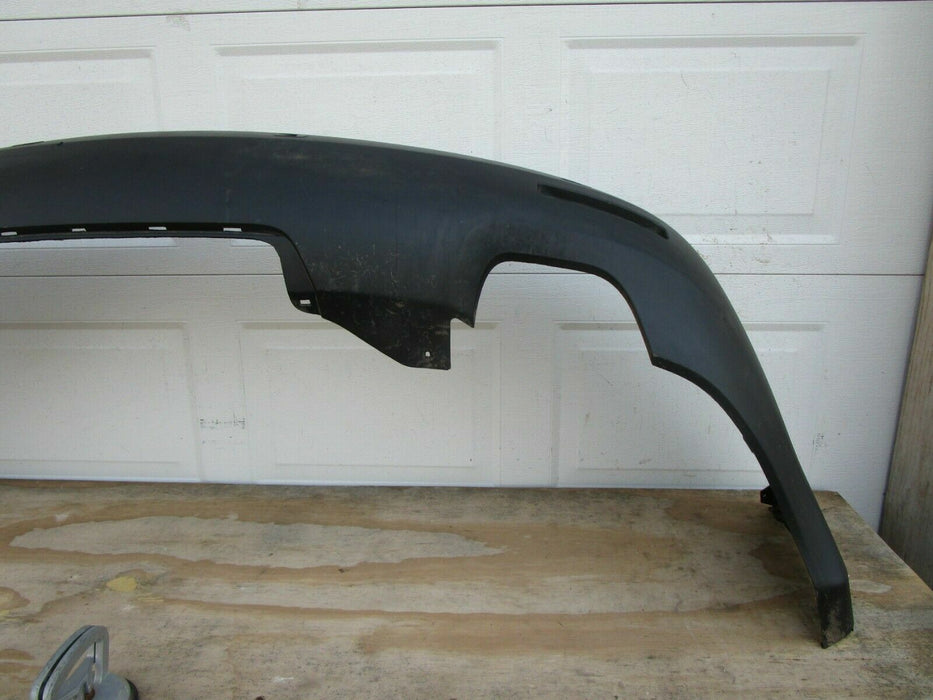 2007-2012 GMC ACADIA REAR BUMPER COVER PANEL PLASTIC W/ SENSOR HOLES OEM