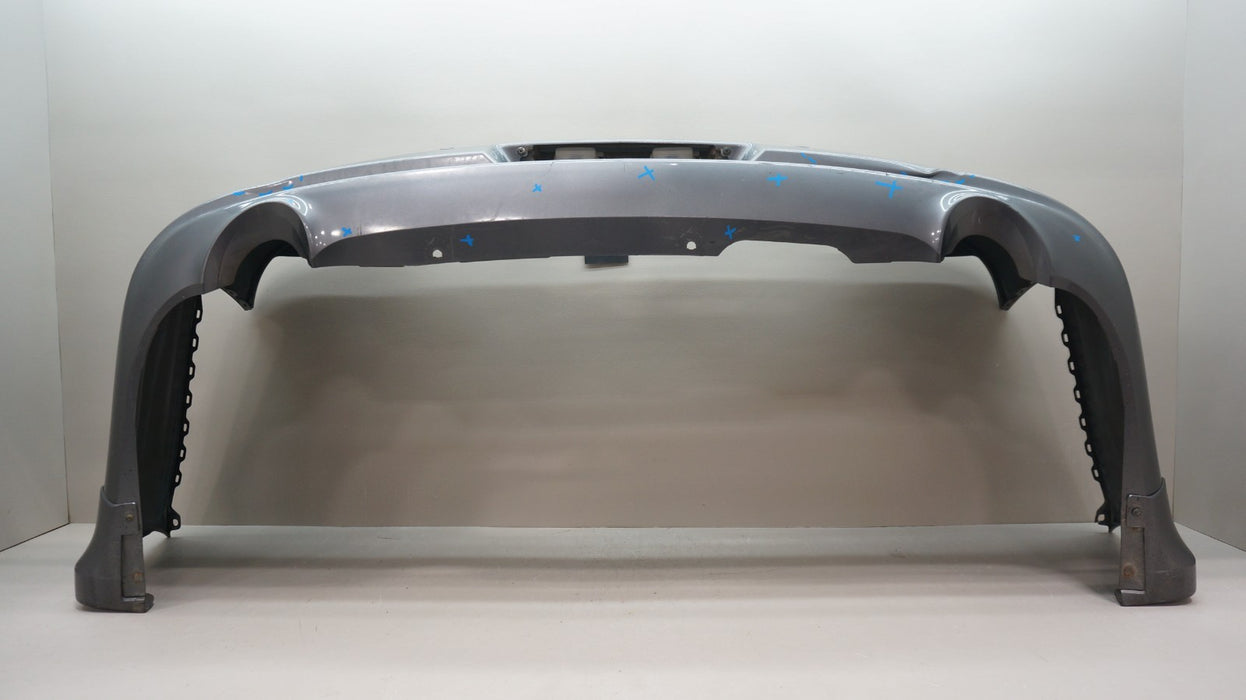 2009-2013 INFINITI G37 SEDAN REAR BUMPER COVER PANEL OEM