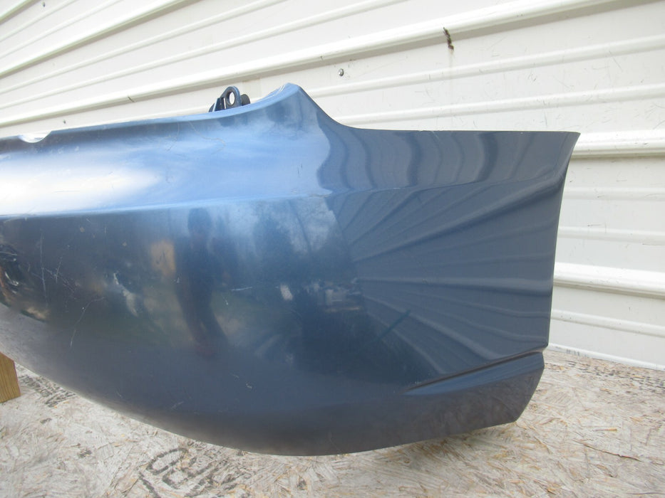 2005 - 2007 SUBARU WRX STI REAR BUMPER COVER PANEL FACTORY 57704FE160 OEM