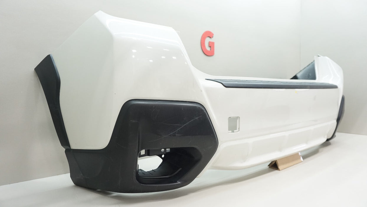 2018-2023 SUBARU CROSSTREK REAR BUMPER COVER PANEL 57704FL250 OEM