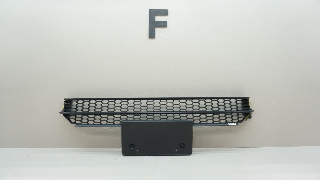 2012-2015 VOLKSWAGEN PASSAT FRONT LOWER GRILLE W/ PLATE HOLDER 561 853 677 OEM